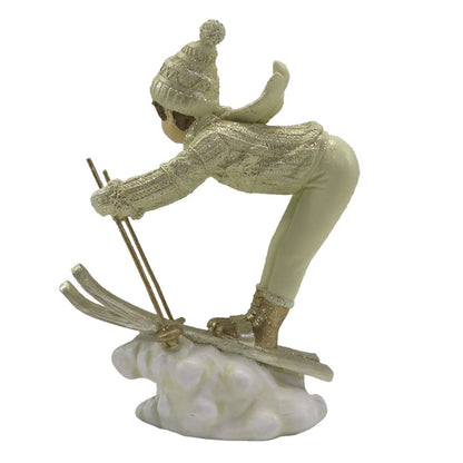 Beeld skiënd kind 19 cm beige goudkleurig kunststof