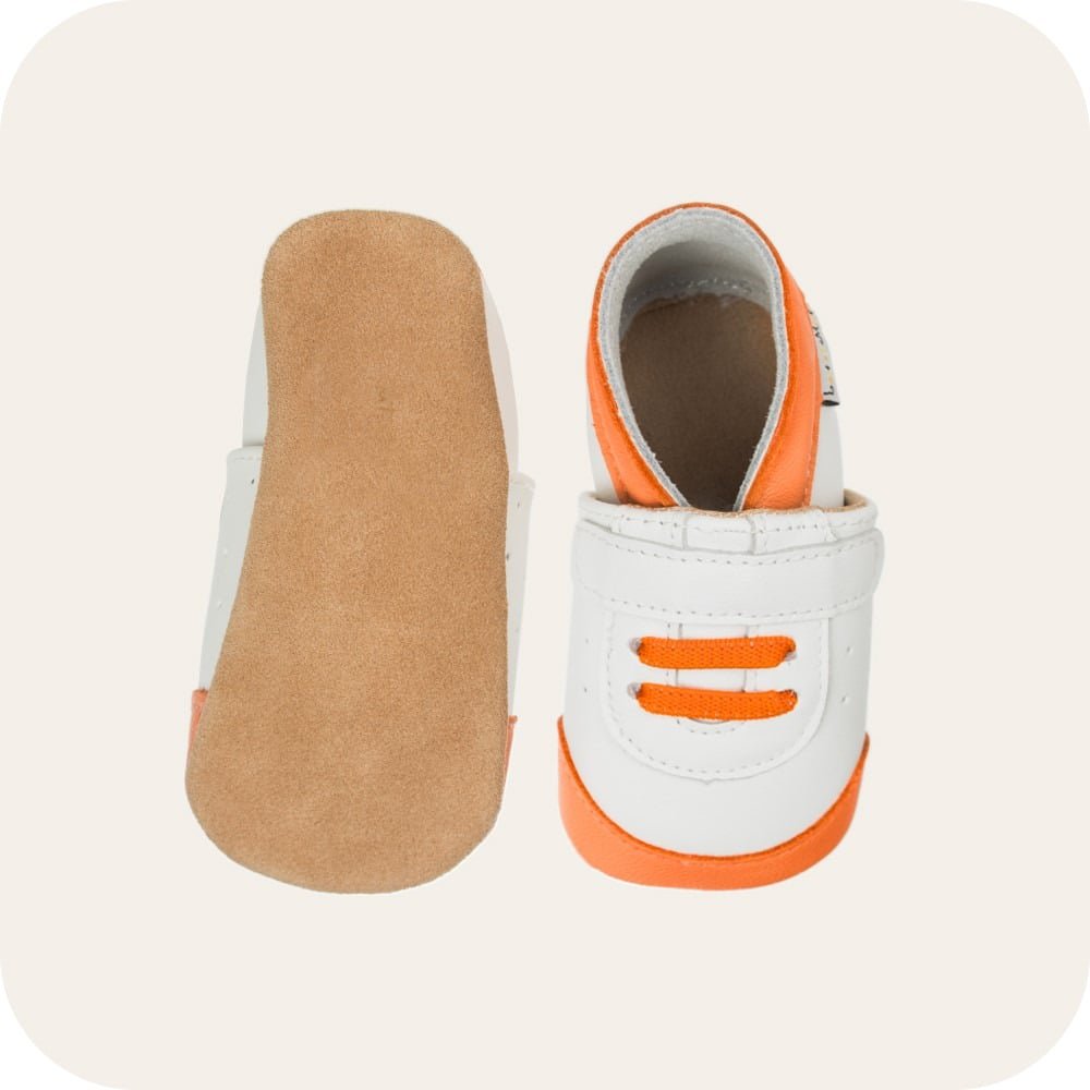 Babyslofjes sneaker wit oranje leer