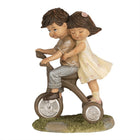 Beeld kinderen op fiets 14 cm bruin polyresin