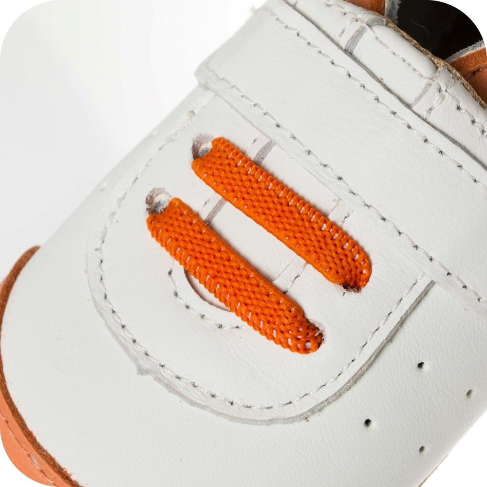 Babyslofjes sneaker wit oranje leer