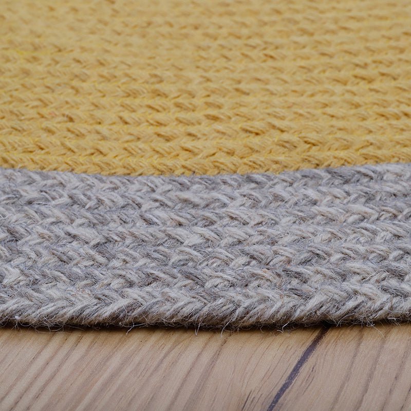 NOLAN TURMERIC Braided Wool Children's Rug
