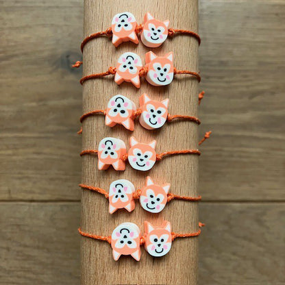 Kinderarmband vos oranje koord verstelbaar