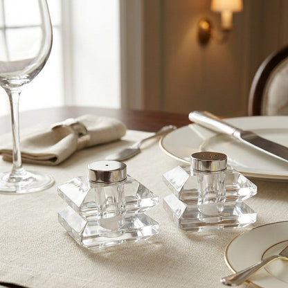 Designer salt and pepper shakers in transparent glass