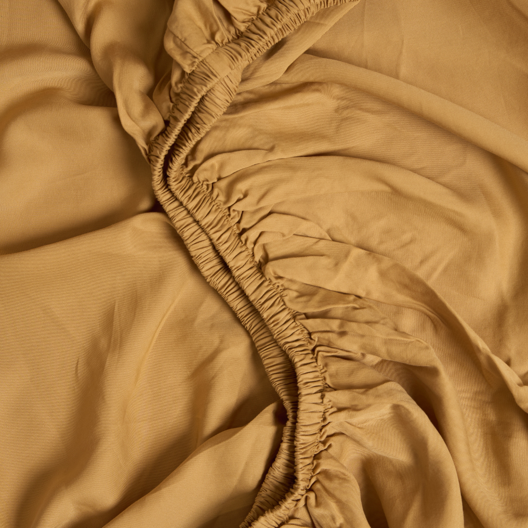Hoeslaken TENCEL twill 60x120 cm okergeel