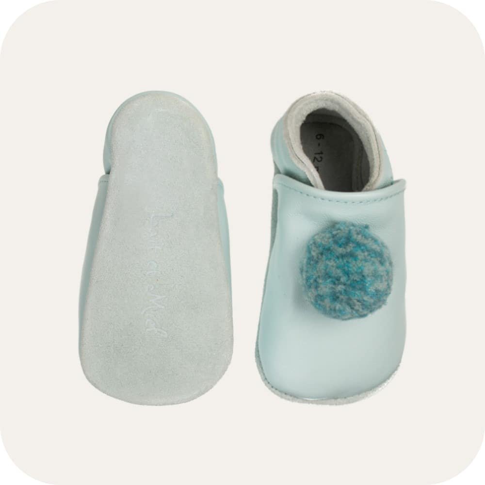 Baby booties with pompoms Sky blue