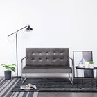 Two-seater sofa with chrome armrests and dark gray velvet