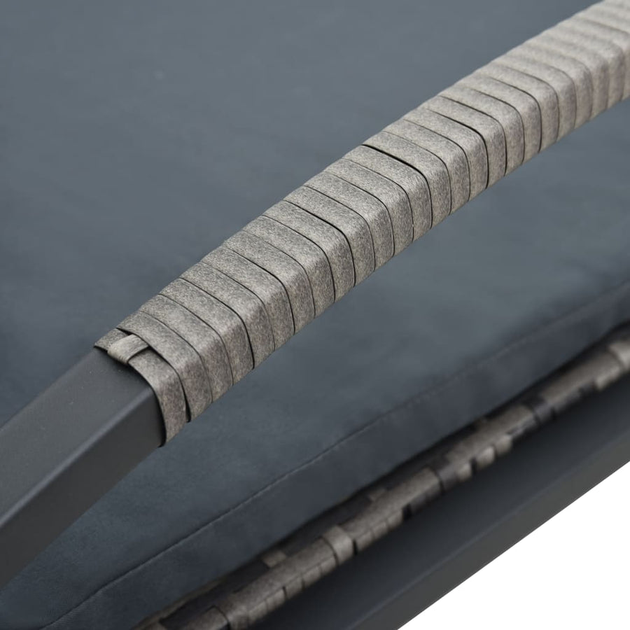 Ligbed met kussen en wielen poly rattan antraciet