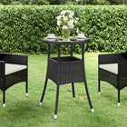 Garden table Ø60x75 cm tempered glass and black poly rattan