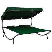 Lounge bed with canopy and green cushions