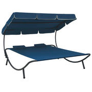 Lounger with canopy and blue cushions