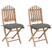 Tuinstoelen 2 st inklapbaar bamboe met kussens
