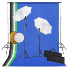 Photo studio set with lights, umbrellas, backdrop, and reflector