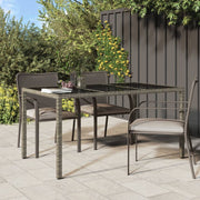 Tuintafel 150x90x75 cm poly rattan glas grijs