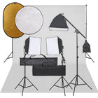 Photo studio set with lighting kit, background, and reflector