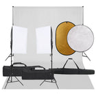 Photo studio set with lighting kit, background, and reflector