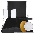Photo studio set with lighting kit, background, and reflector