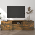Tv-meubel 140x35x40 cm bewerkt hout gerookt eiken