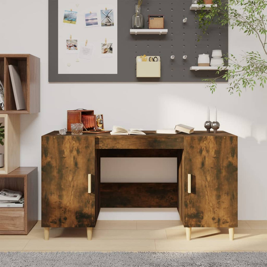 Bureau 140x50x75 cm bewerkt hout gerookt eikenkleurig