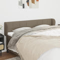 Hoofdbord met randen 163x23x78/88 cm stof taupe