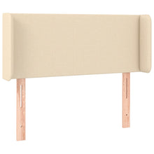 Hoofdbord met randen 83x16x78/88 cm stof crèmekleurig