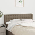 Hoofdbord met randen 147x16x78/88 cm stof taupe
