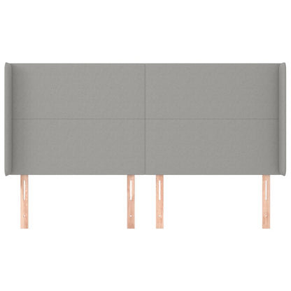 Hoofdbord met randen 183x16x118/128 cm stof lichtgrijs