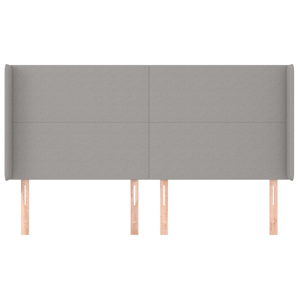 Hoofdbord met randen 203x16x118/128 cm stof lichtgrijs
