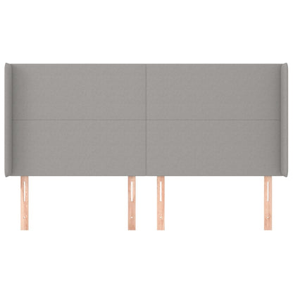 Hoofdbord met randen 203x16x118/128 cm stof lichtgrijs