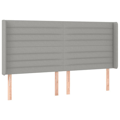 Hoofdbord met randen 183x16x118/128 cm stof lichtgrijs 183 x 16 x 118/128 cm Lichtgrijs