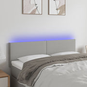 Hoofdbord 144x5x78/88 cm stof lichtgrijs LED