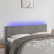 Hoofdbord 144x5x78/88 cm fluweel lichtgrijs LED