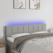 Hoofdbord 144x5x78/88 cm stof lichtgrijs LED
