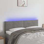 Hoofdbord 144x5x78/88 cm fluweel lichtgrijs LED