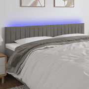 Hoofdbord 160x5x78/88 cm fluweel lichtgrijs LED