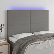 Hoofdbord 144x5x118/128 cm stof donkergrijs LED
