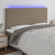 Hoofdbord 160x5x118/128 cm stof taupe LED