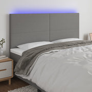 Hoofdbord 180x5x118/128 cm stof donkergrijs LED