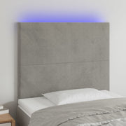 Hoofdbord 80x5x118/128 cm fluweel lichtgrijs LED