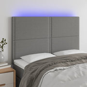 Hoofdbord 144x5x118/128 cm stof donkergrijs LED