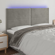 Hoofdbord 200x5x118/128 cm fluweel lichtgrijs LED