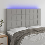 Hoofdbord 144x5x118/128 cm stof lichtgrijs LED