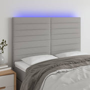 Hoofdbord 144x5x118/128 cm stof lichtgrijs LED