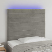Hoofdbord 90x5x118/128 cm fluweel lichtgrijs LED