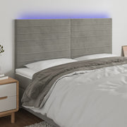 Hoofdbord 160x5x118/128 cm fluweel lichtgrijs LED