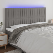 Hoofdbord 160x5x118/128 cm stof donkergrijs LED