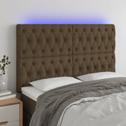 Hoofdbord 160x7x118/128 cm stof donkerbruin LED