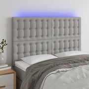 Hoofdbord 144x5x118/128 cm stof lichtgrijs LED