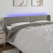 Hoofdbord 203x16x78/88 cm fluweel lichtgrijs LED