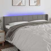 Hoofdbord 163x16x78/88 cm stof donkergrijs LED
