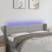 Hoofdbord 147x16x78/88 cm stof lichtgrijs LED